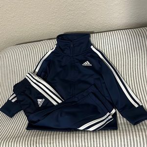 12 month Navy Adidas jump suit. Never worn, no tags